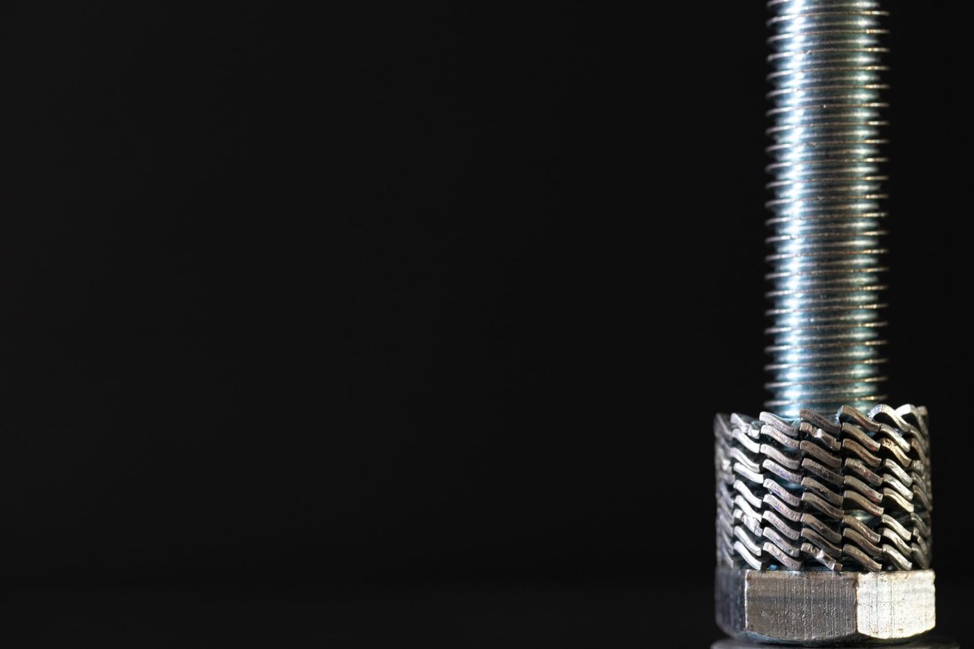 Fully threaded rod with spring washers and hex nut